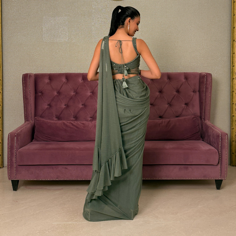 Green Chinnon Saree with Stitched Net Blouse