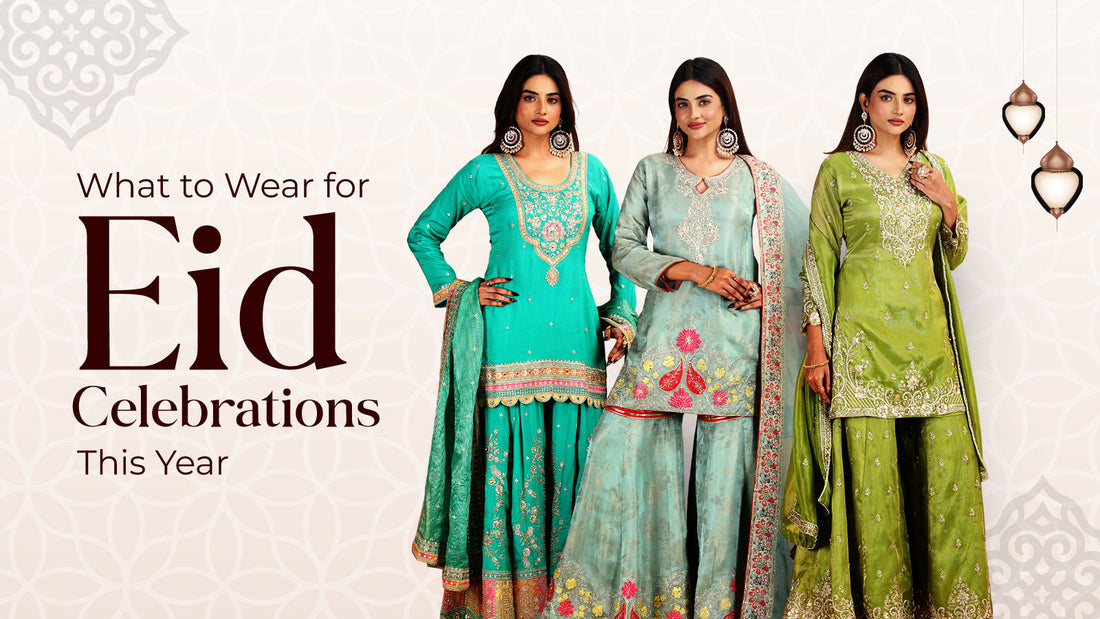 Three women in intricately embroidered green and blue traditional outfits, posing confidently for Eid celebrations. Elegant lanterns add festive ambiance.