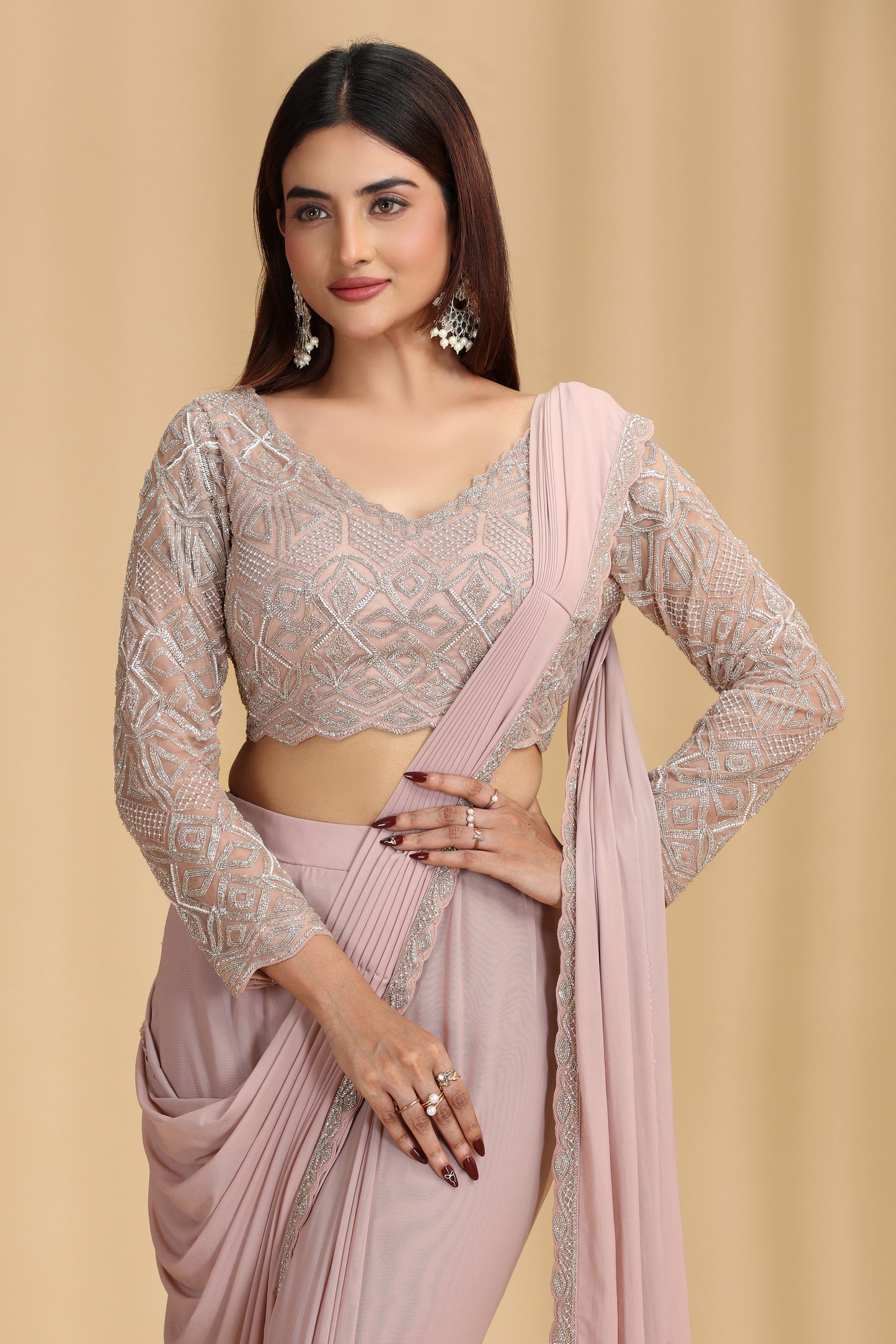 Beige Draped Saree with Intricate Beaded Blouse