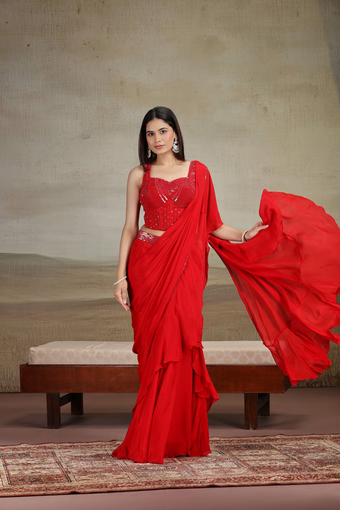 Bold Red Draped Saree with Embellished Blouse