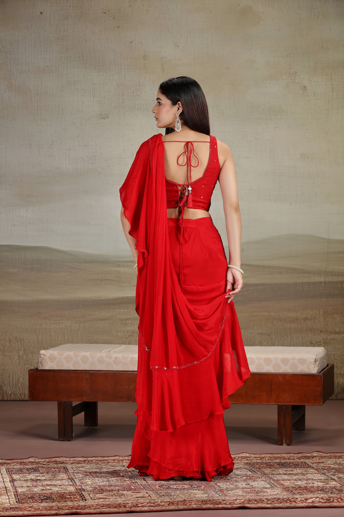 Bold Red Draped Saree with Embellished Blouse