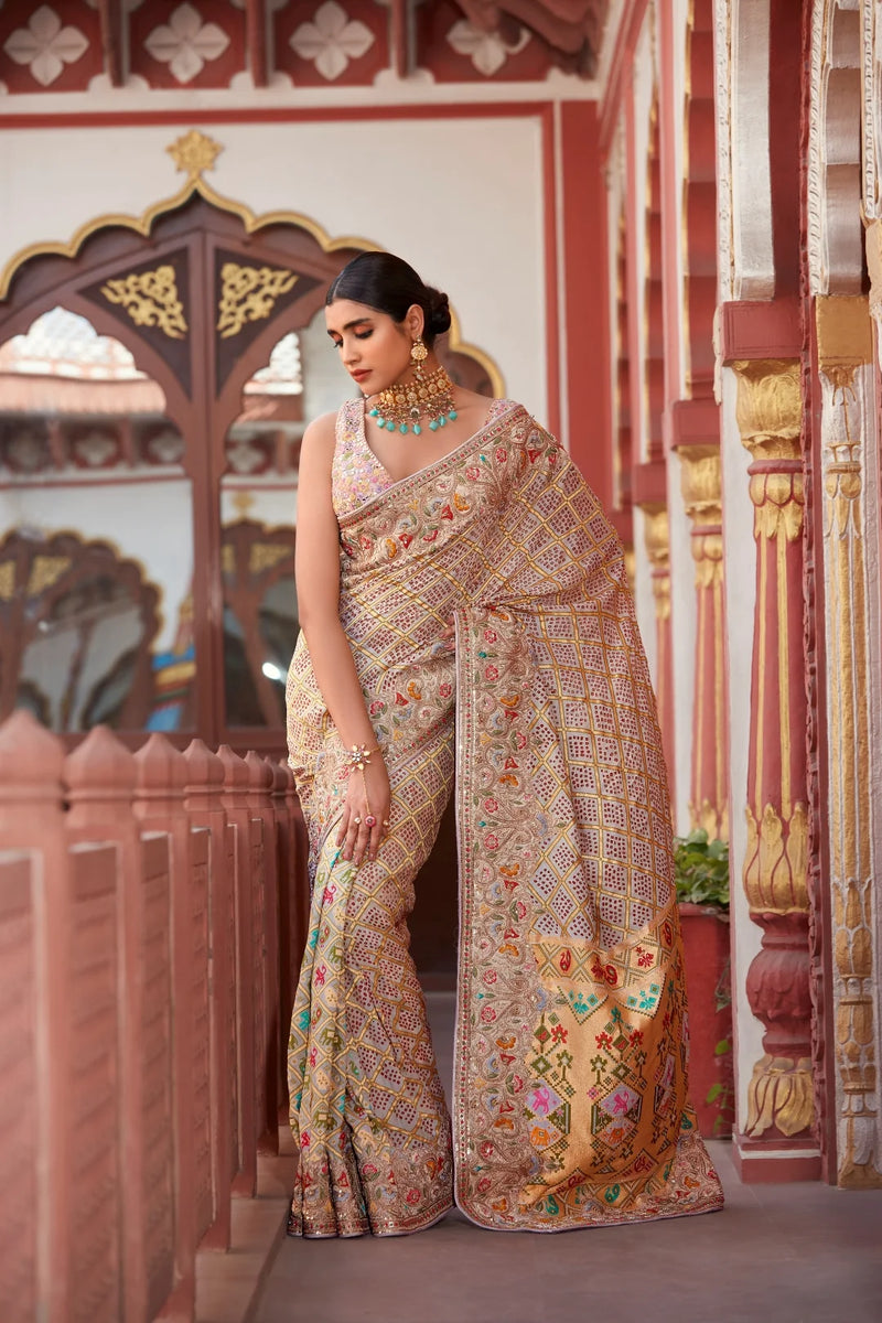Pastel Ivory Georgette Bandhej Saree with Multicolour Weaving