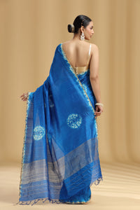 Woman wearing a Royal Blue Dola Silk Batik Print Saree