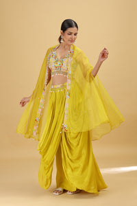 Woman wearing a yellow traditional outfit with a beige background