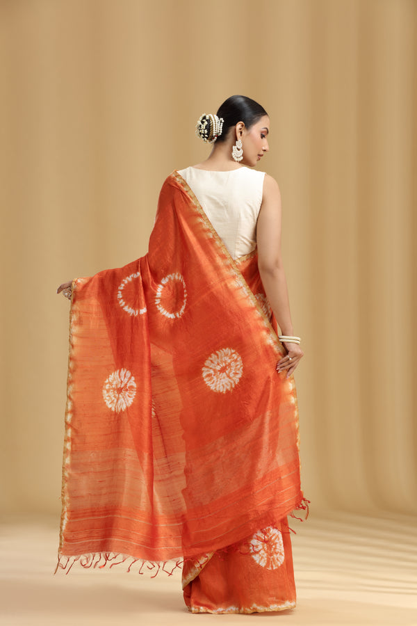 Rust Orange Raw Silk Saree with Batik Print and Unstitched Blouse