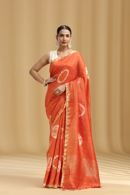 Rust Orange Raw Silk Saree with Batik Print and Unstitched Blouse