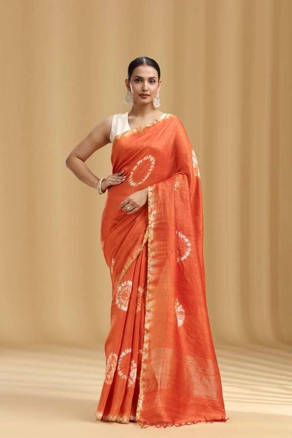 Rust Orange Raw Silk Saree with Batik Print and Unstitched Blouse