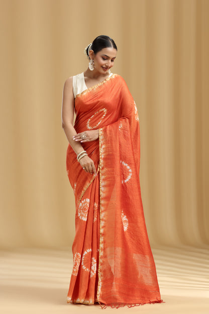 Rust Orange Raw Silk Saree with Batik Print and Unstitched Blouse