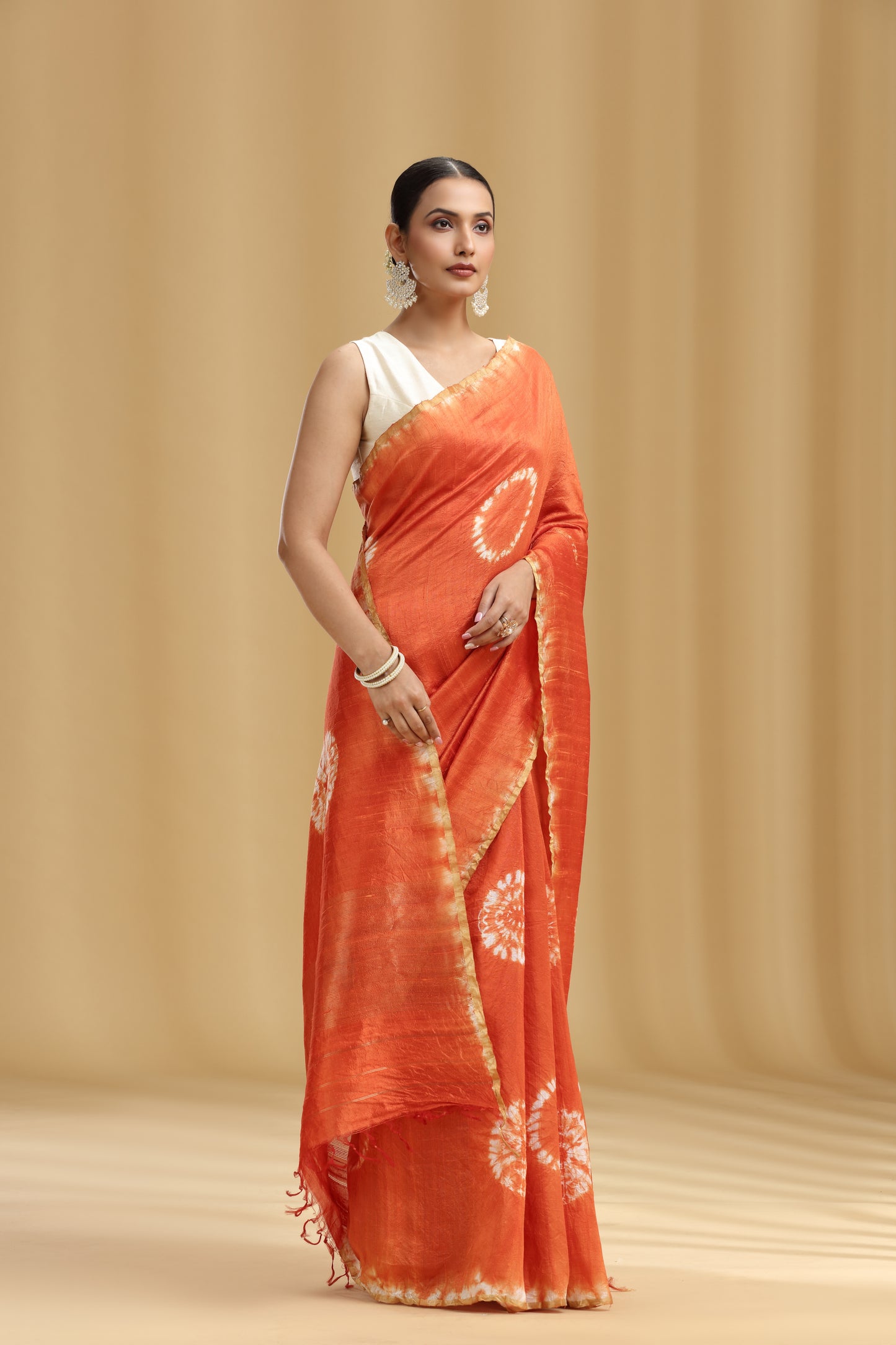 Rust Orange Raw Silk Saree with Batik Print and Unstitched Blouse