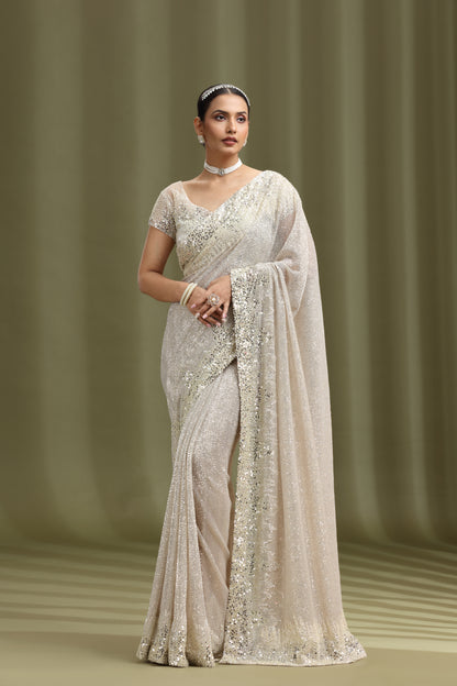 Ivory Net Saree with Sequins, Beads & Cutdana Work (Unstitched)