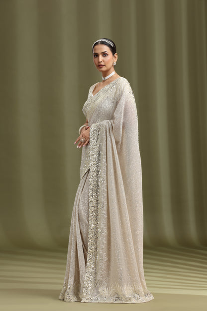 Ivory Net Saree with Sequins, Beads & Cutdana Work (Unstitched)