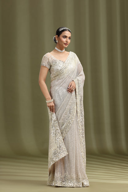 Ivory Net Saree with Sequins, Beads & Cutdana Work (Unstitched)