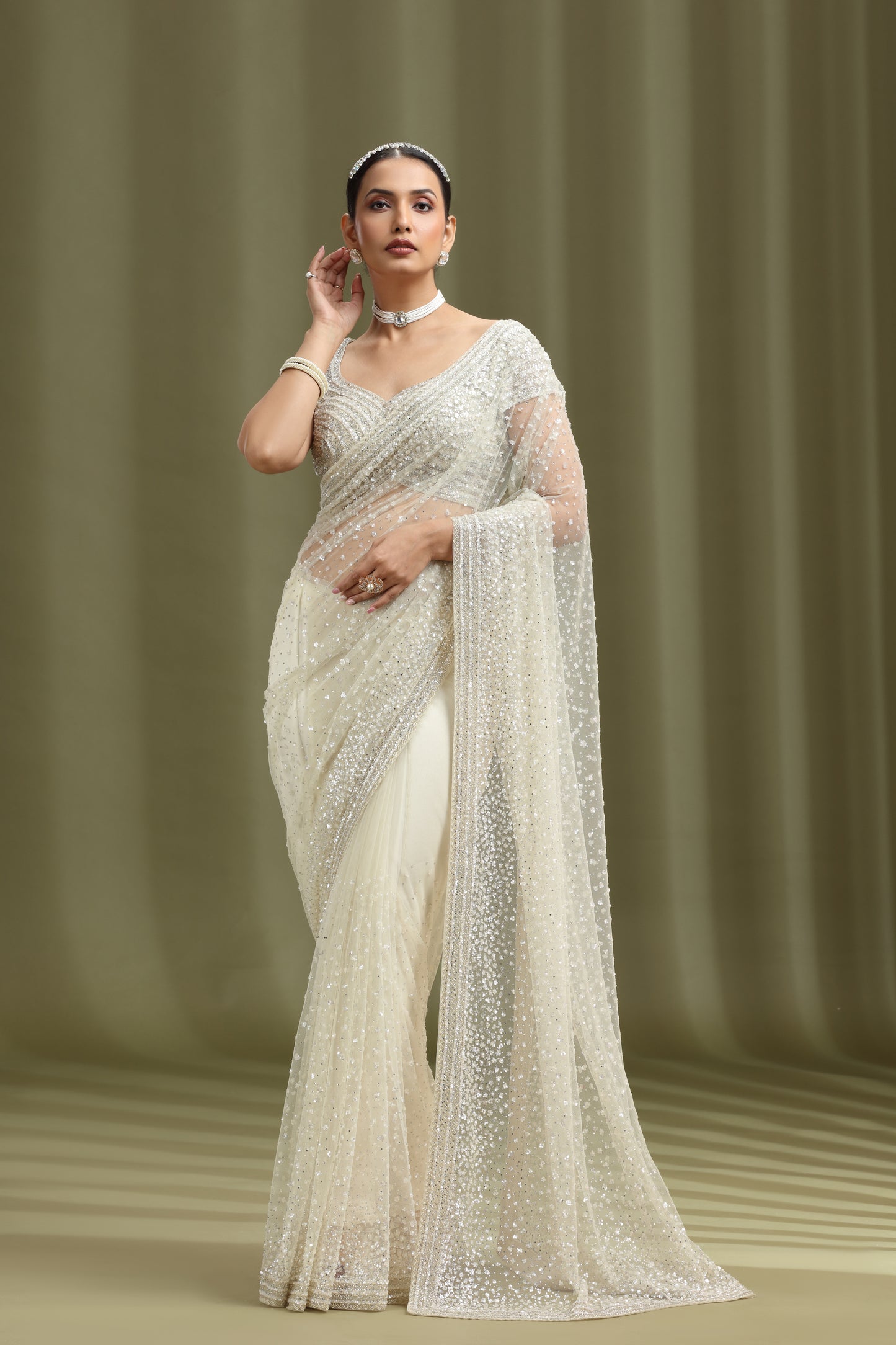 Ivory Net Saree with Sequins & Cutdana Work (Unstitched)