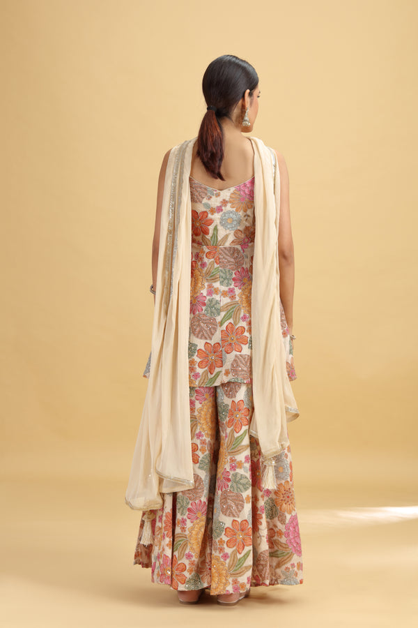 Rose Gold Crepe Suit Set with Chinnon Dupatta & Mirror Work