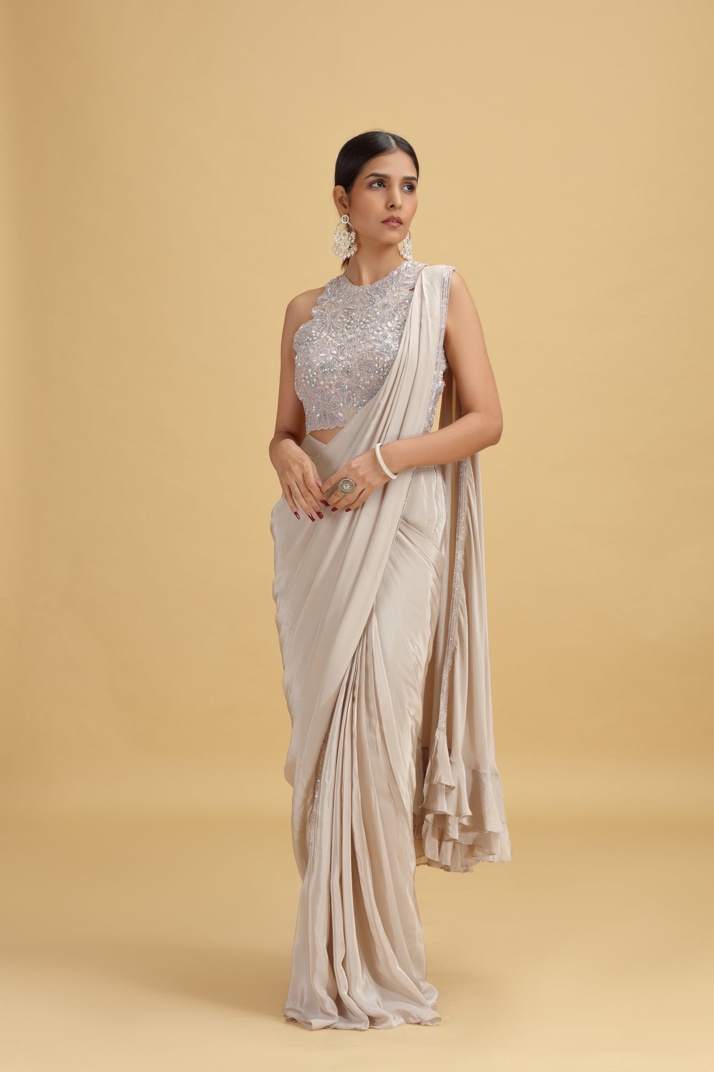 Beige Crepe Saree with Net Blouse & Heavy Moti-Sequins Work