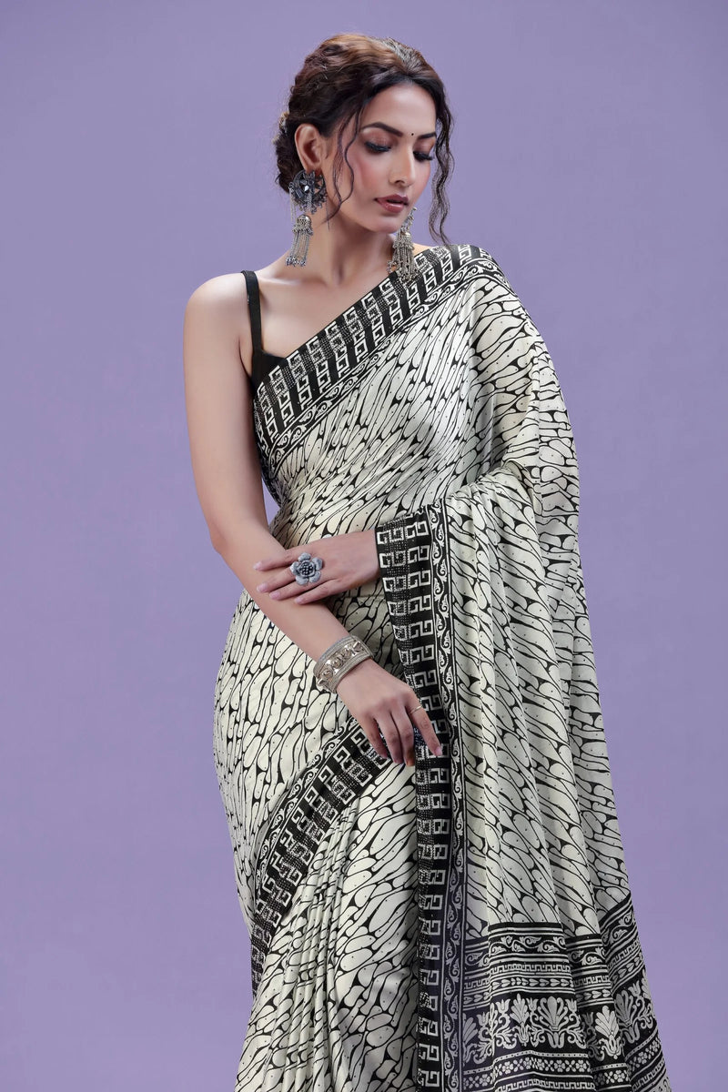 White Printed Satin Silk Saree with Swarovski Detail & Black Unstitched Blouse