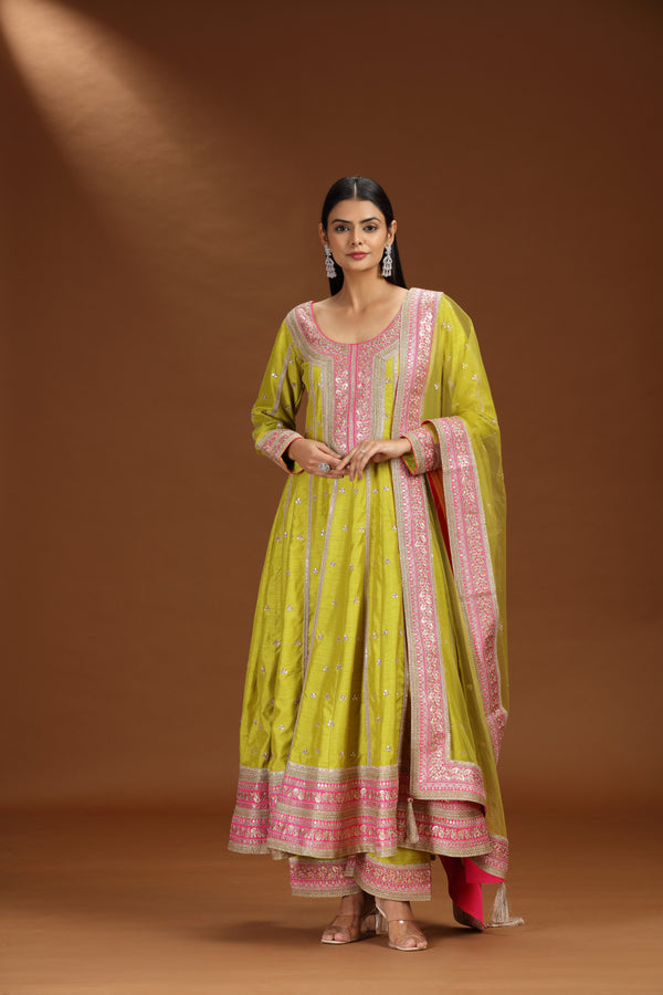 Green Raw Silk Salwar Suit with Net Dupatta