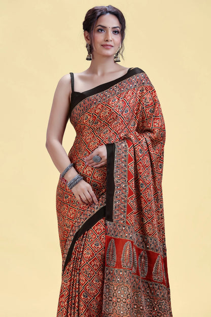 Rust Red Satin Silk Saree with Blue Folk Print & Hand Embellishment