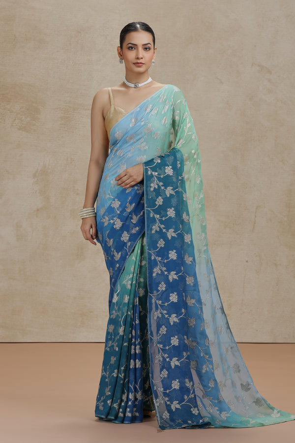 Ambre Organza Saree with Woven Detailing & Teal Blue Dola Silk Blouse