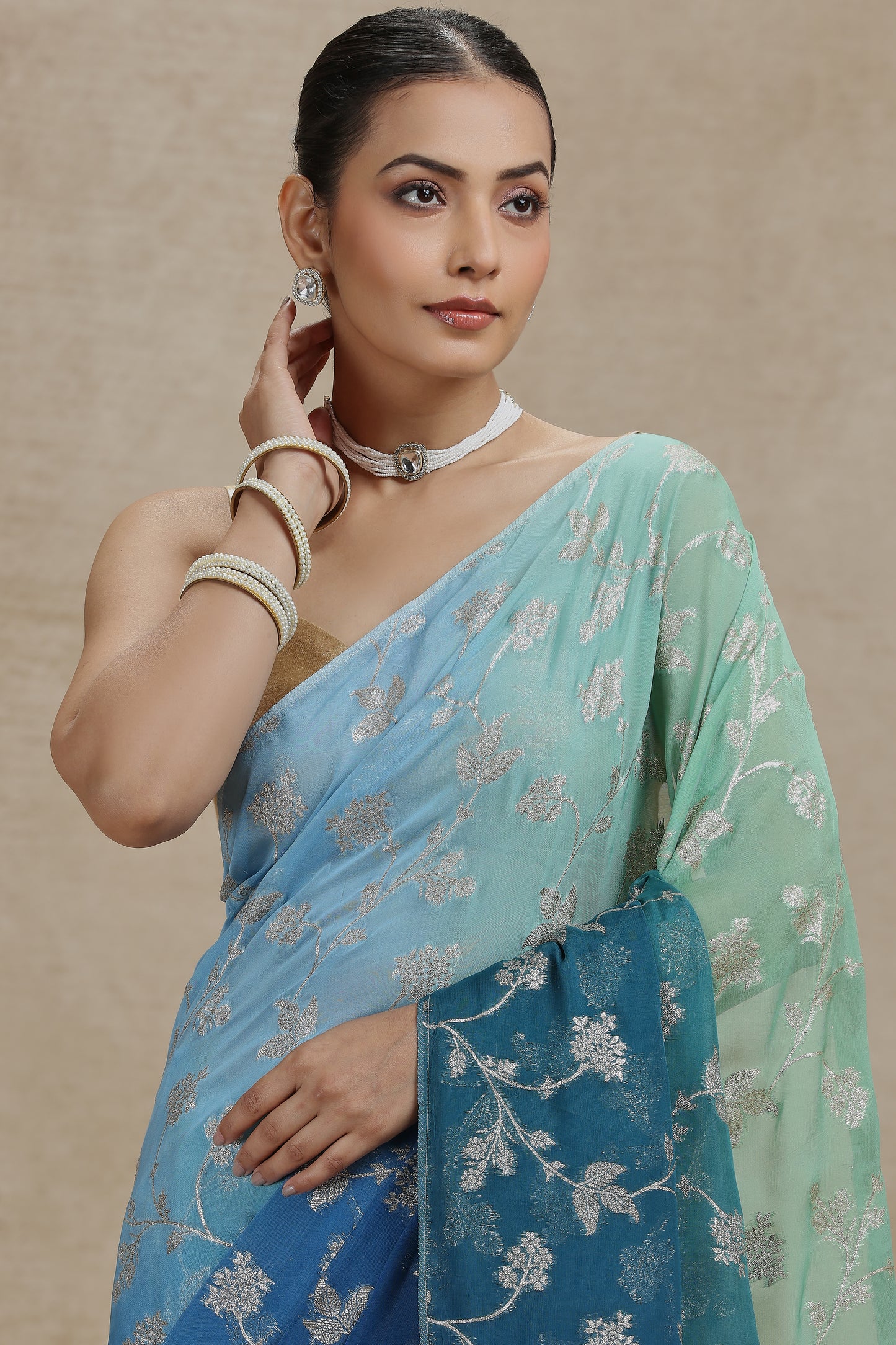 Ambre Organza Saree with Woven Detailing & Teal Blue Dola Silk Blouse