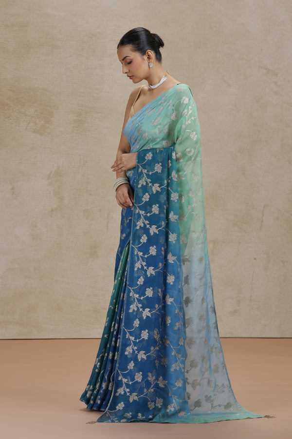 Ambre Organza Saree with Woven Detailing & Teal Blue Dola Silk Blouse