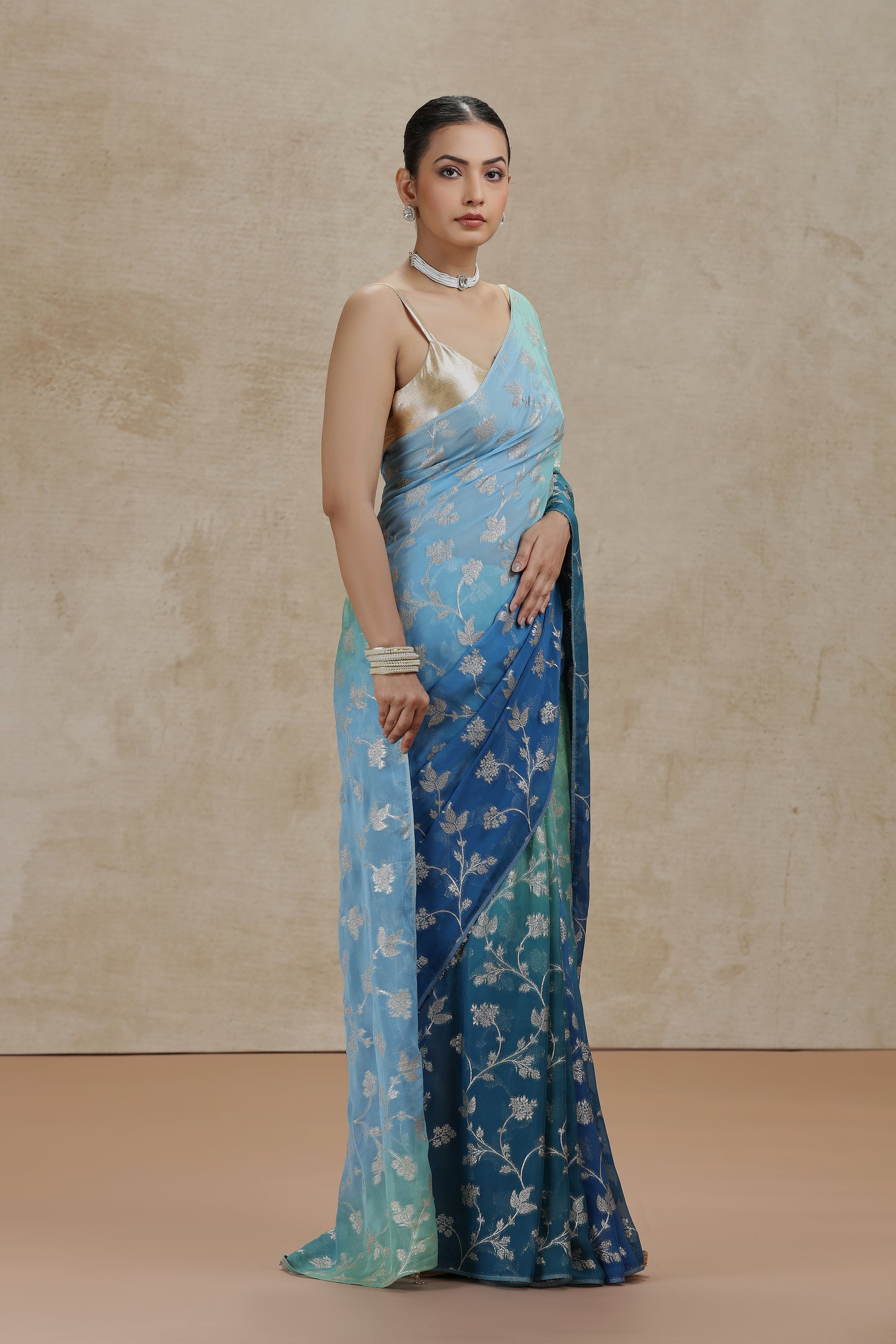 Ambre Organza Saree with Woven Detailing & Teal Blue Dola Silk Blouse