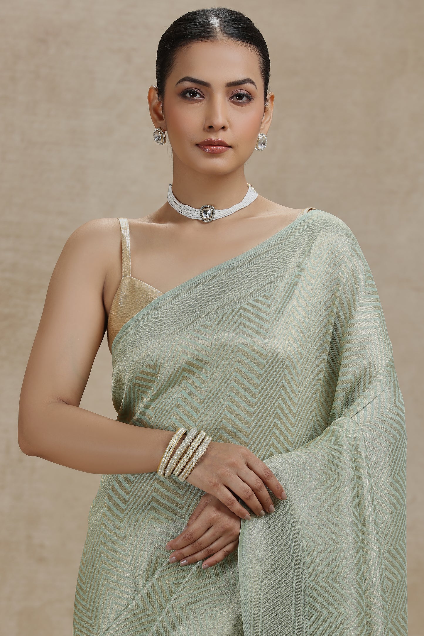 Pista Green Dola Silk Saree with Woven Detailing