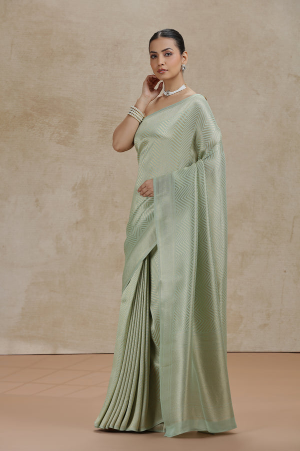 Pista Green Dola Silk Saree with Woven Detailing