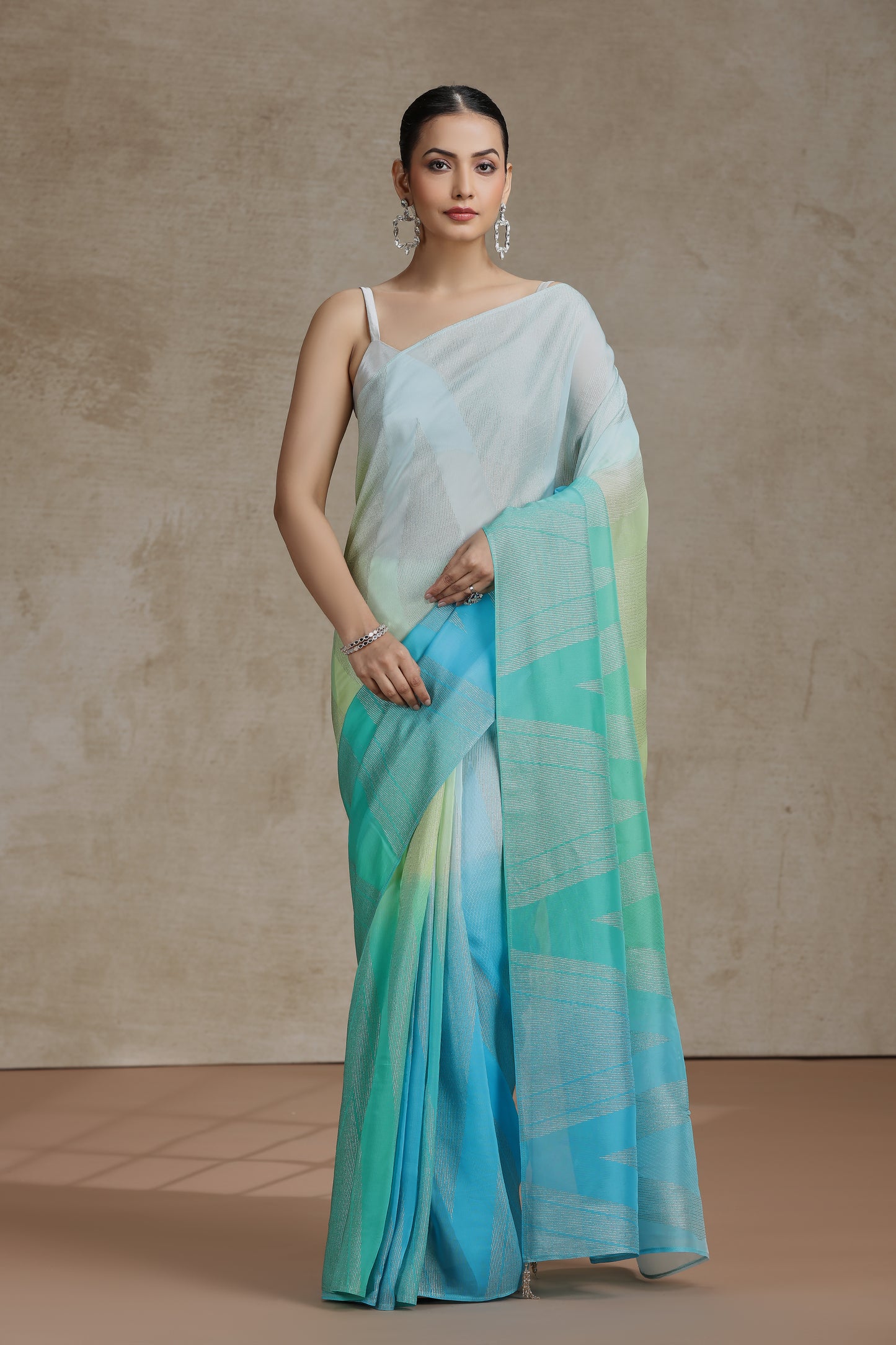 Ambre Organza Saree with Weaving & Firozi Blue Dola Silk Blouse