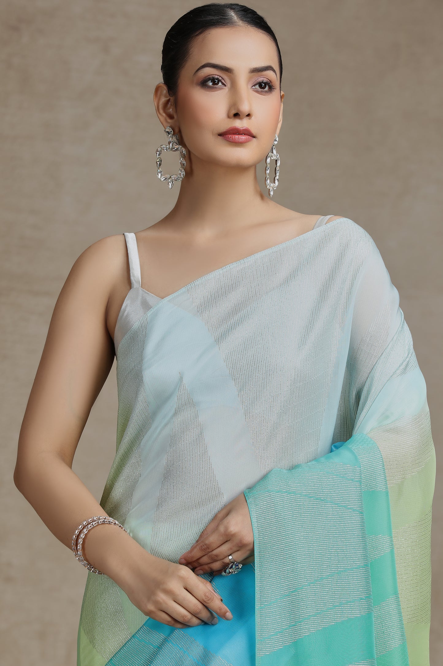 Ambre Organza Saree with Weaving & Firozi Blue Dola Silk Blouse