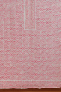 Textile with a red and white geometric pattern on a plain background