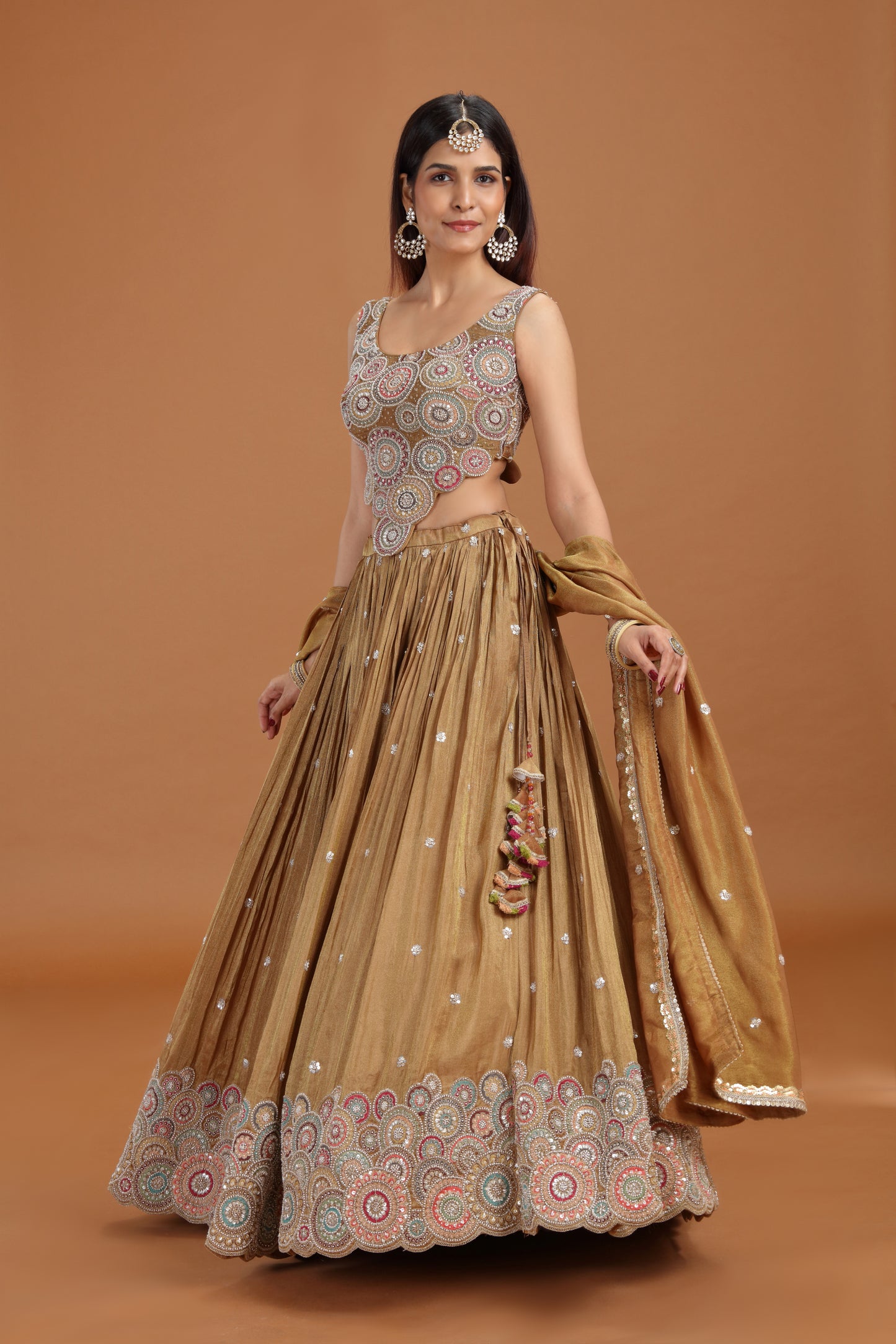 Woman wearing Dusty Gold Sequin Work Lehenga Set