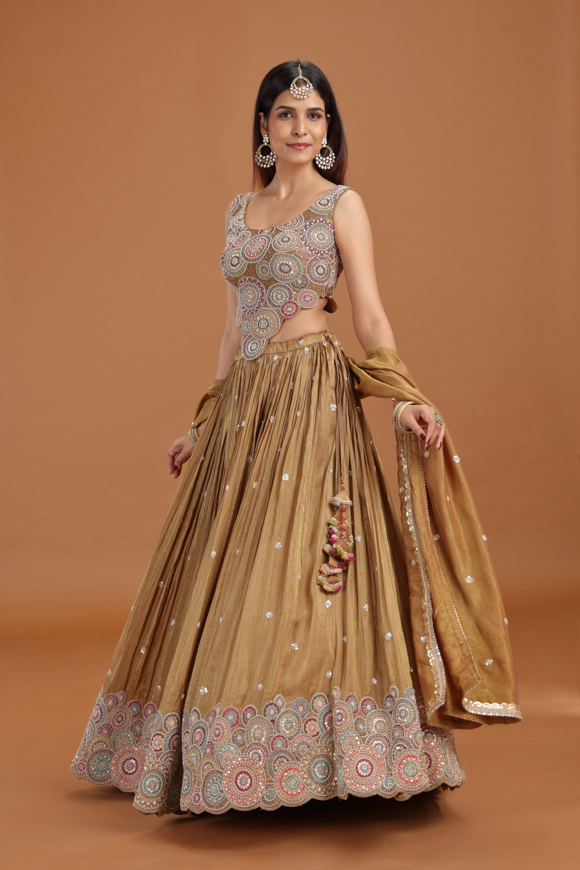 Woman wearing Dusty Gold Sequin Work Lehenga Set