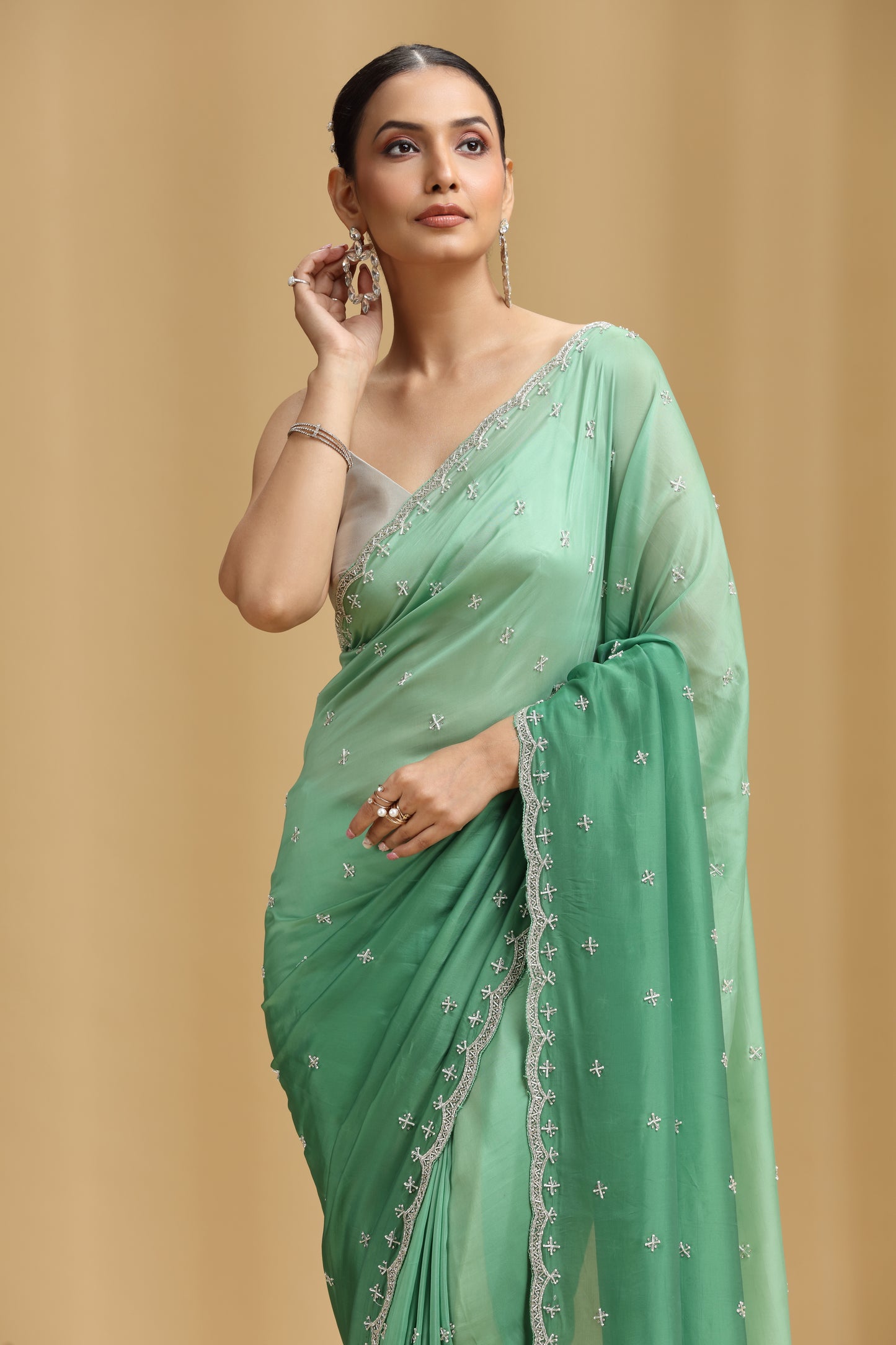 Green Crepe Saree with Cutdana, Pearl & Stone Work (Unstitched)