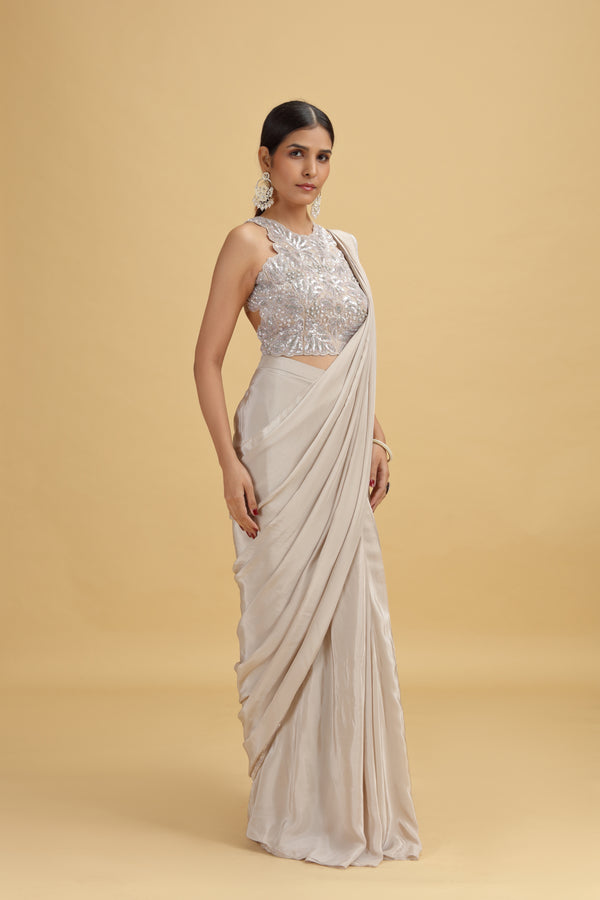 Beige Crepe Saree with Net Blouse & Heavy Moti-Sequins Work