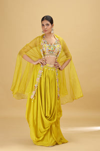 Woman wearing a yellow traditional outfit with a beige background