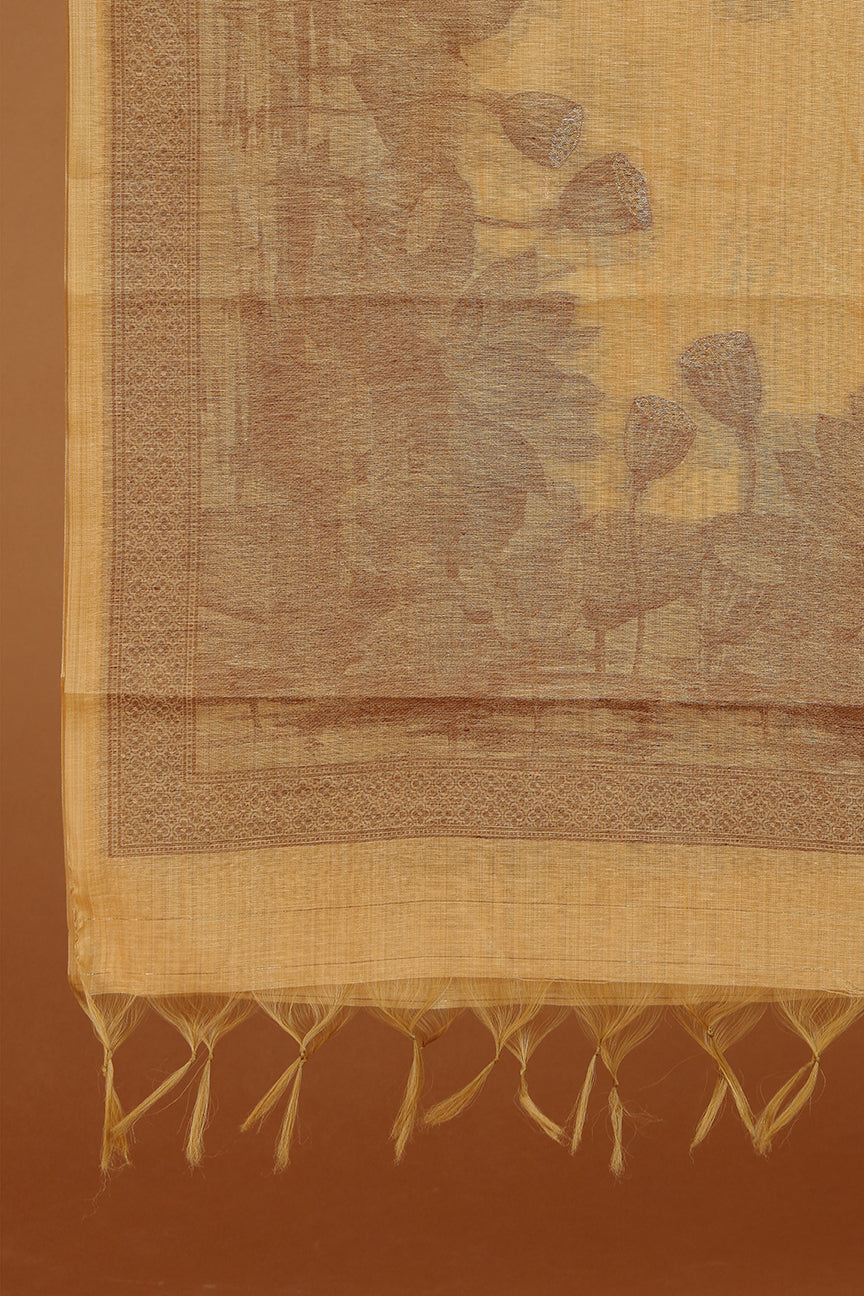 Textile with intricate patterns and fringes on a brown background
