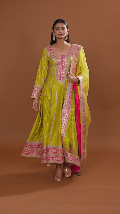 Green Raw Silk Salwar Suit with Net Dupatta